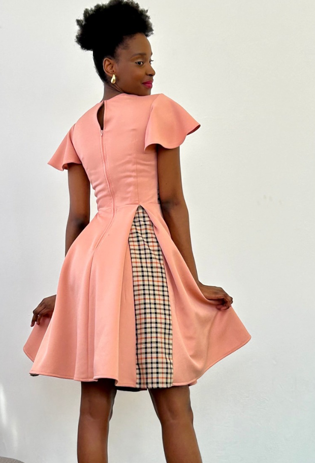 “Sigma” check kick-pleat dress